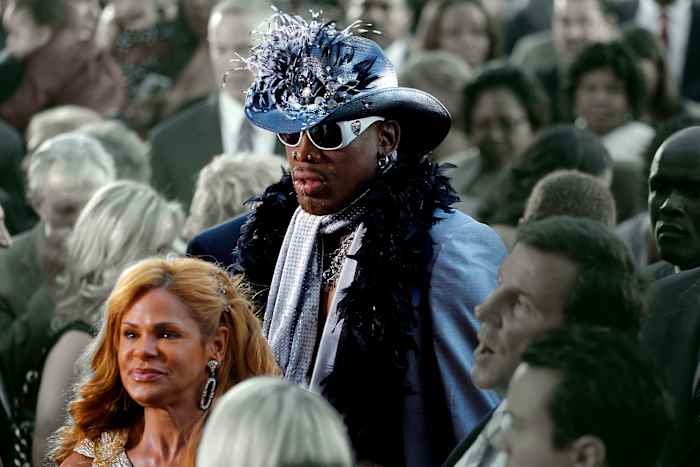 Peggy with Rodman at his Hall of Fame ceremony.